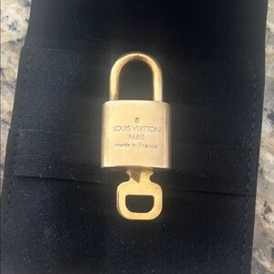 Vintage 316 Louis Vuitton Luxurious Gold Lock